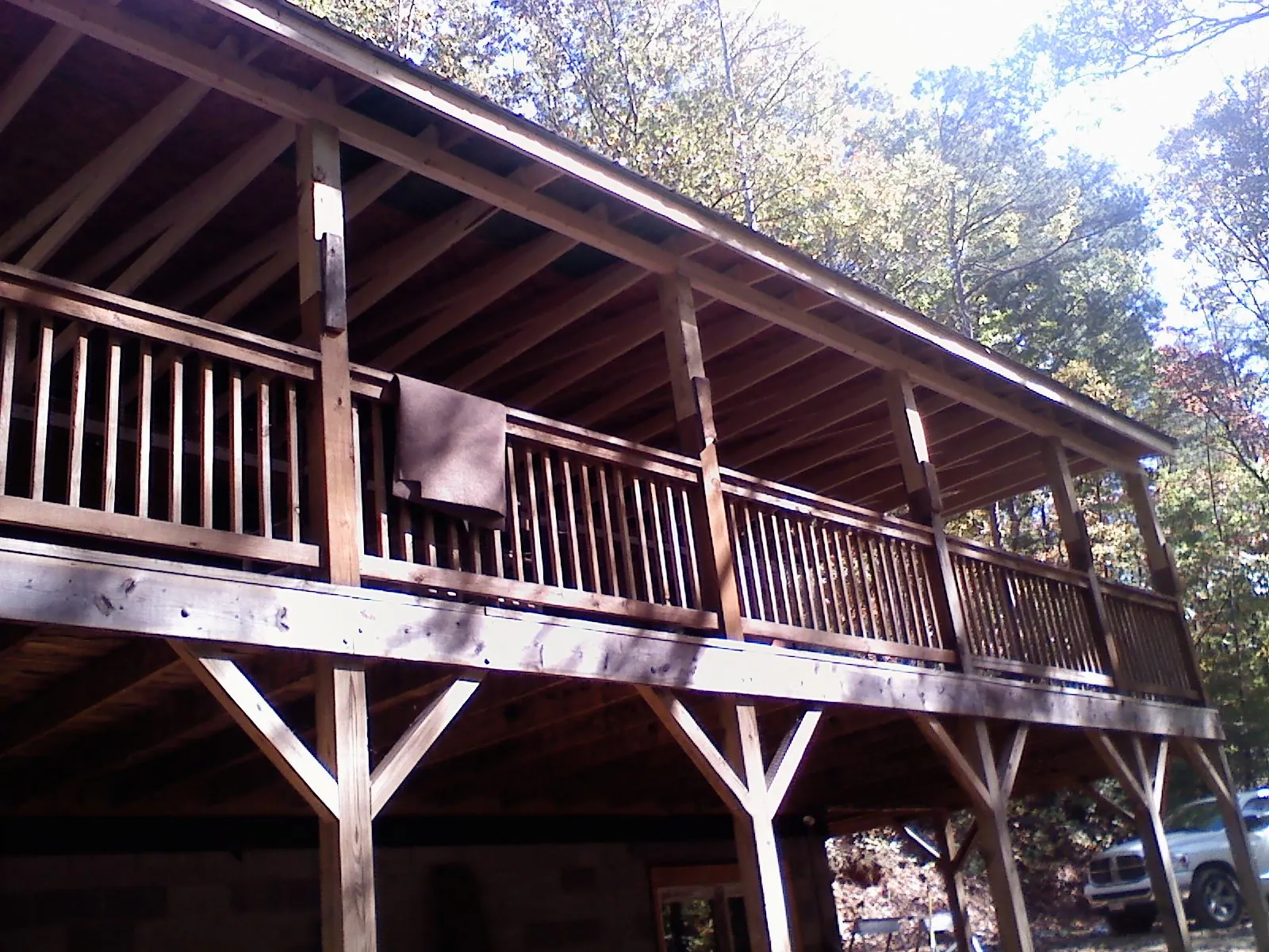 Timber framing under a new elevated porch and deck — Roof Leak Repair in Blairsburg by Roofing Brothers
